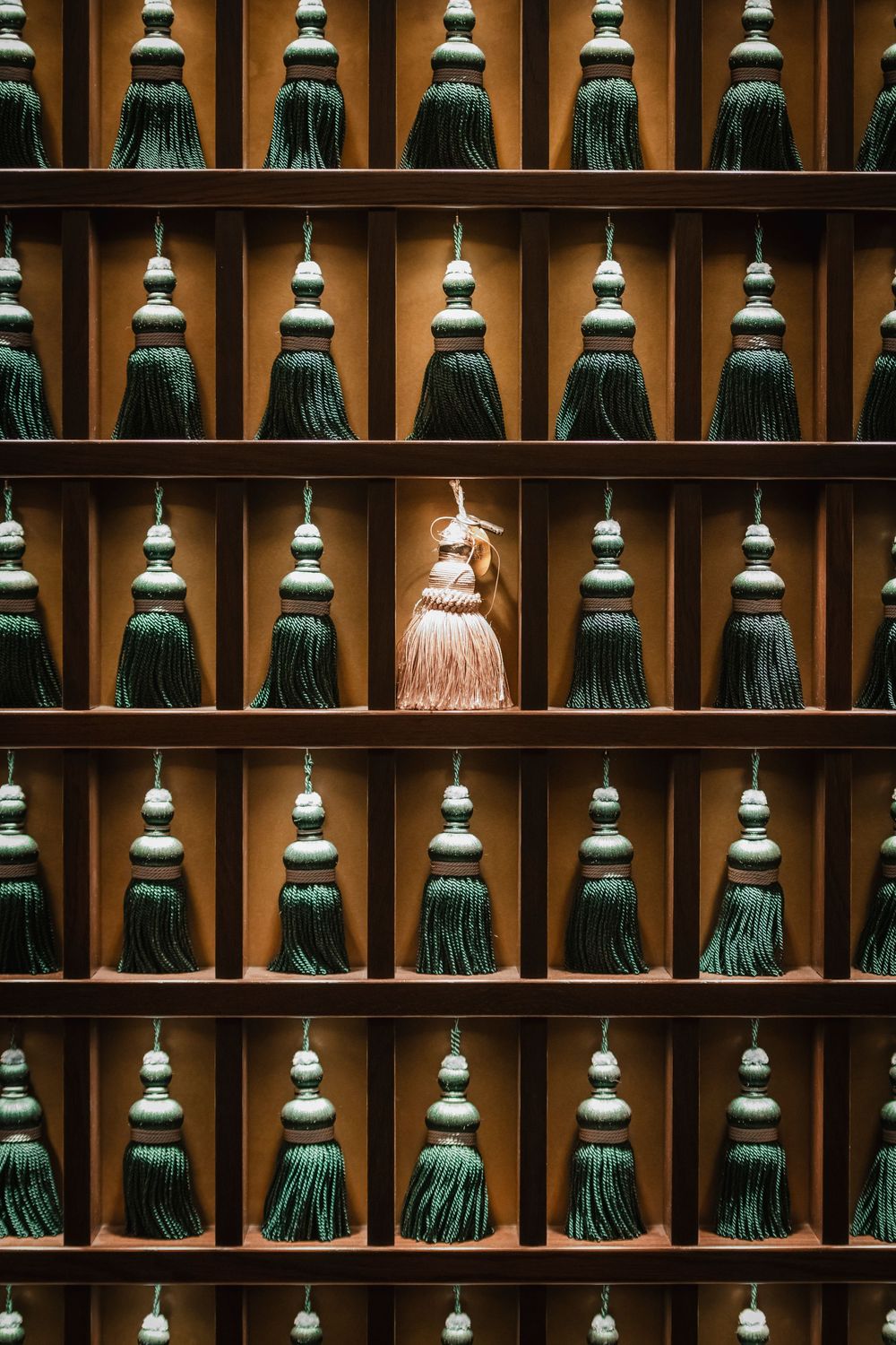 Rows of green fabric details in the Bellevue Hotel lobby