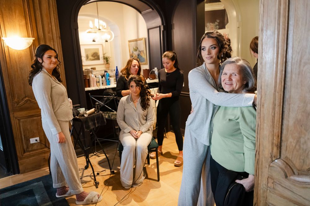 A series of candid moments at an elegant indoor event showing people mingling and conversing in a warmly lit space.