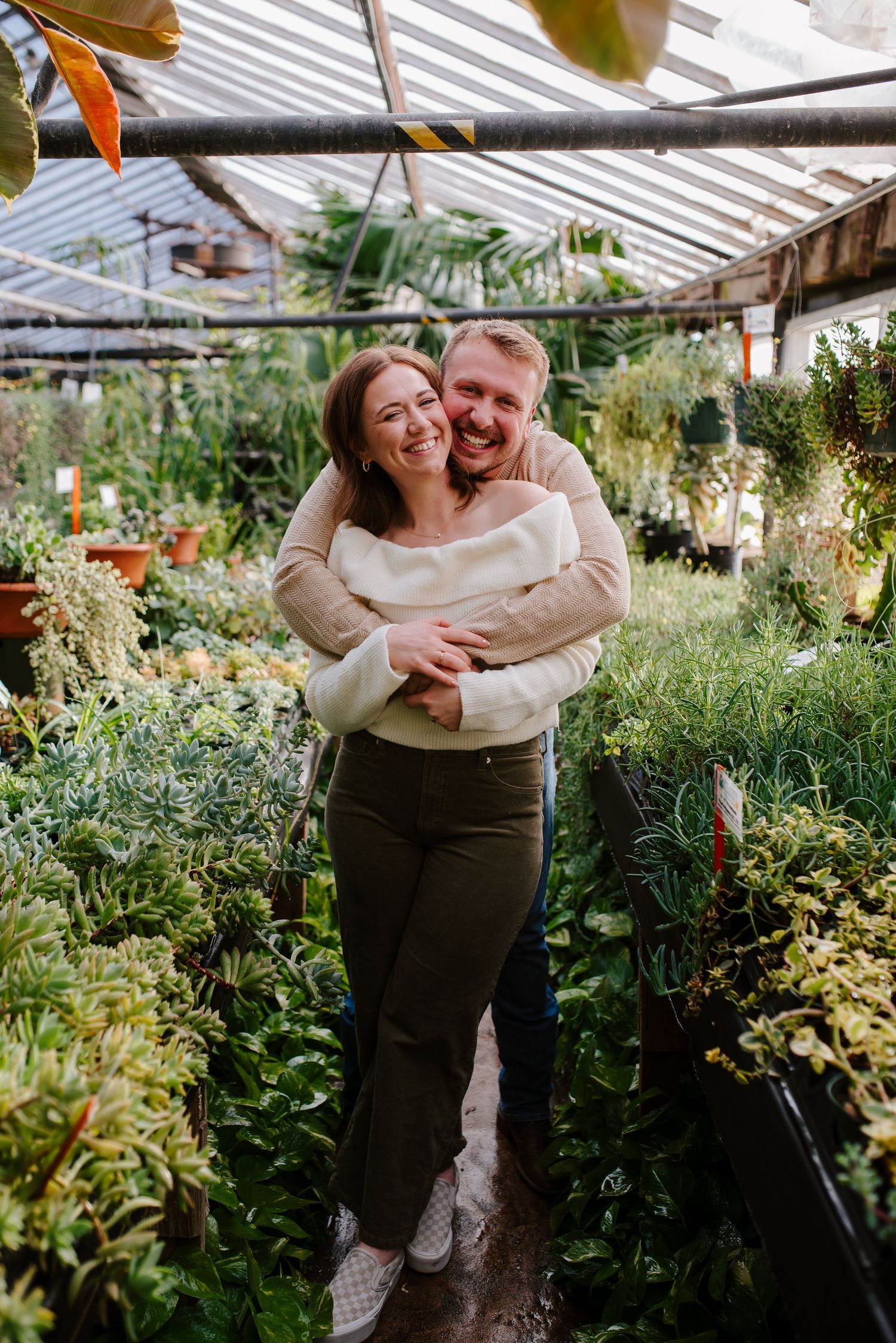 Greenhouse engagement session in Wichita, KS - Plant Kingdom engagement pictures by Jessica Nadine Photography