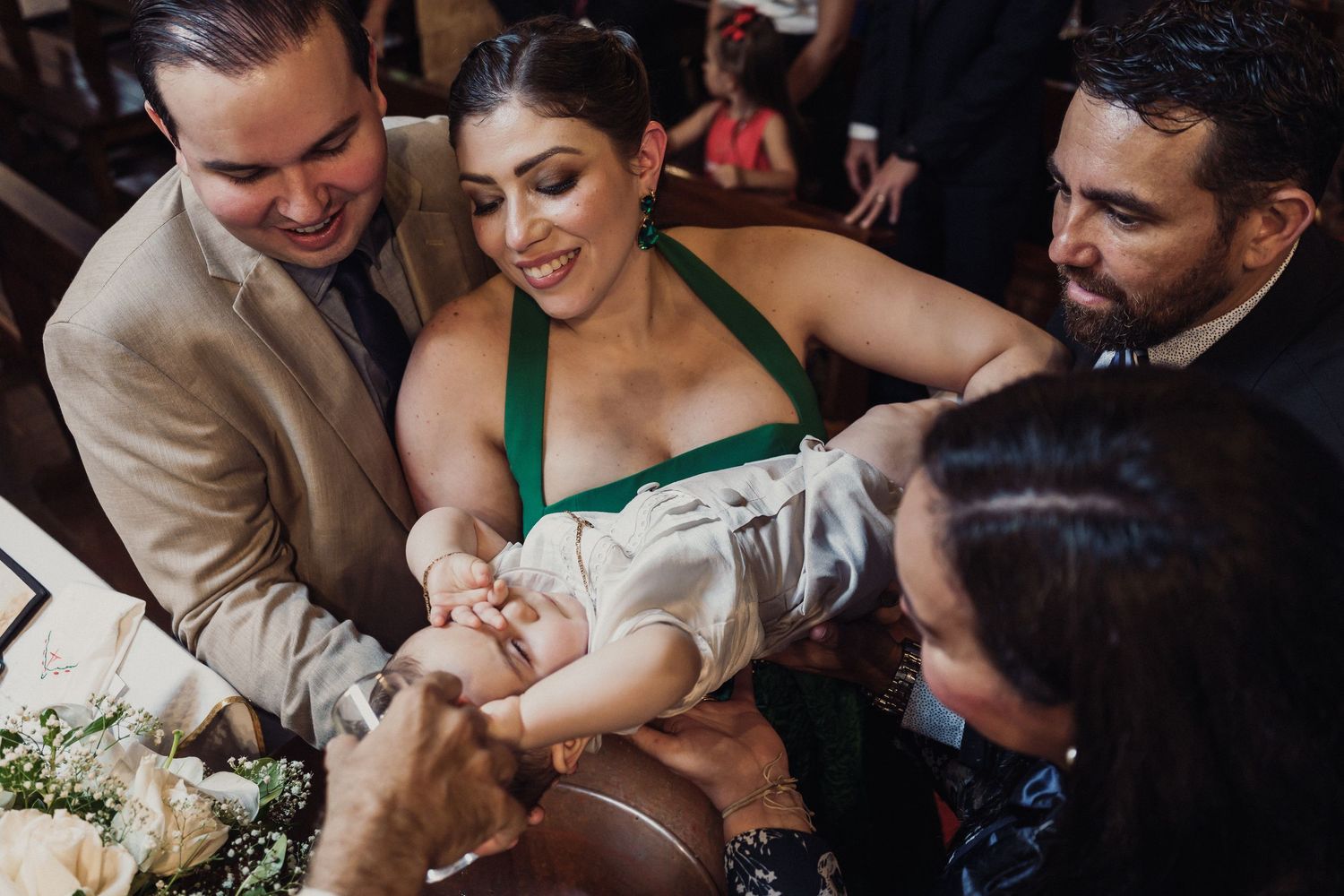 Candid wedding moments captured in a series of black and white photographs showing tender interactions.