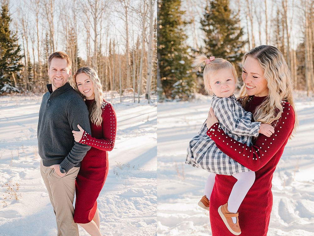 Family enjoying a winter photoshoot in the snow with evergreen trees and birch forest in the background.