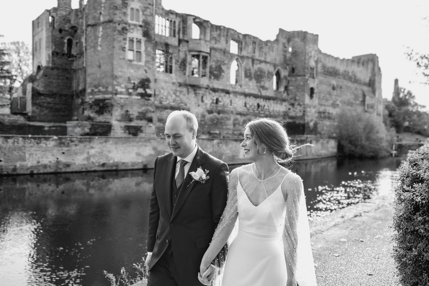 Natural couple photos near Newark Castle after a registry office wedding.