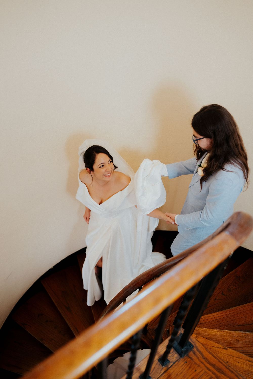 Series of candid shots showing two people interacting on a wooden staircase.