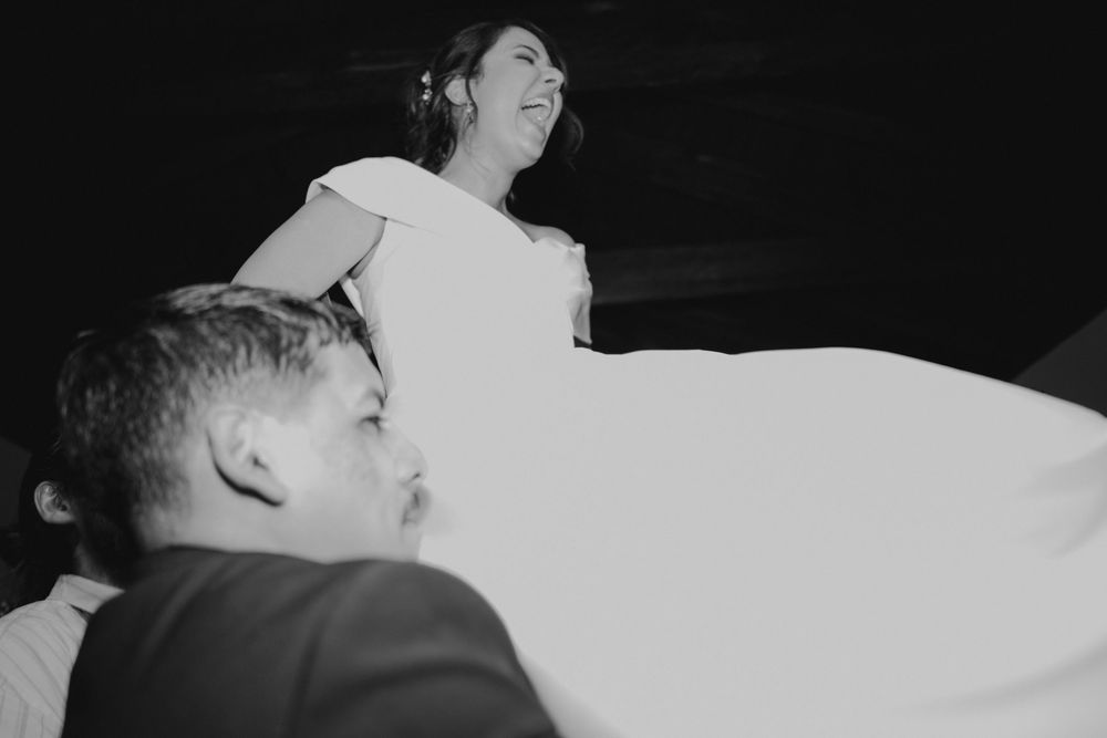 A series of black and white photos showing a person sleeping in bed.