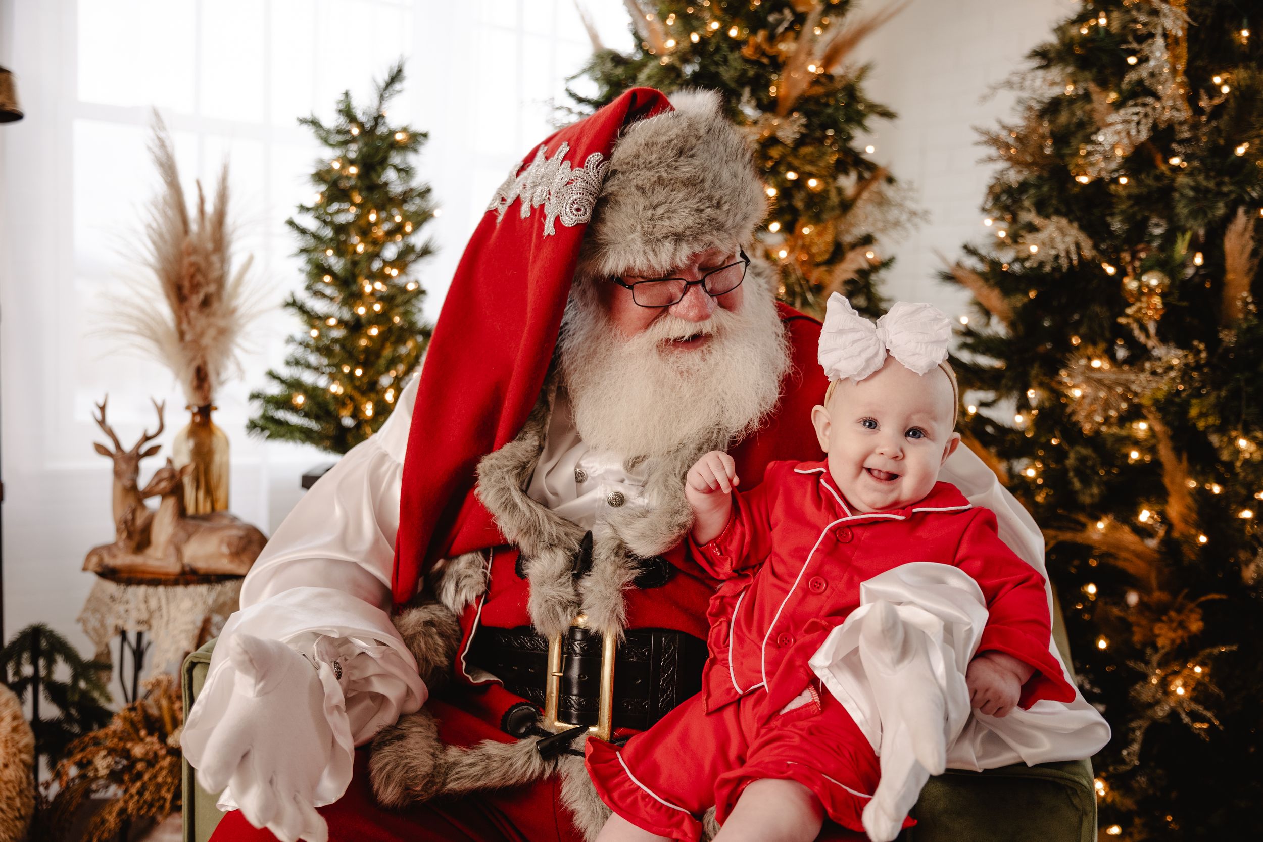 Baby's first Christmas with Santa Claus