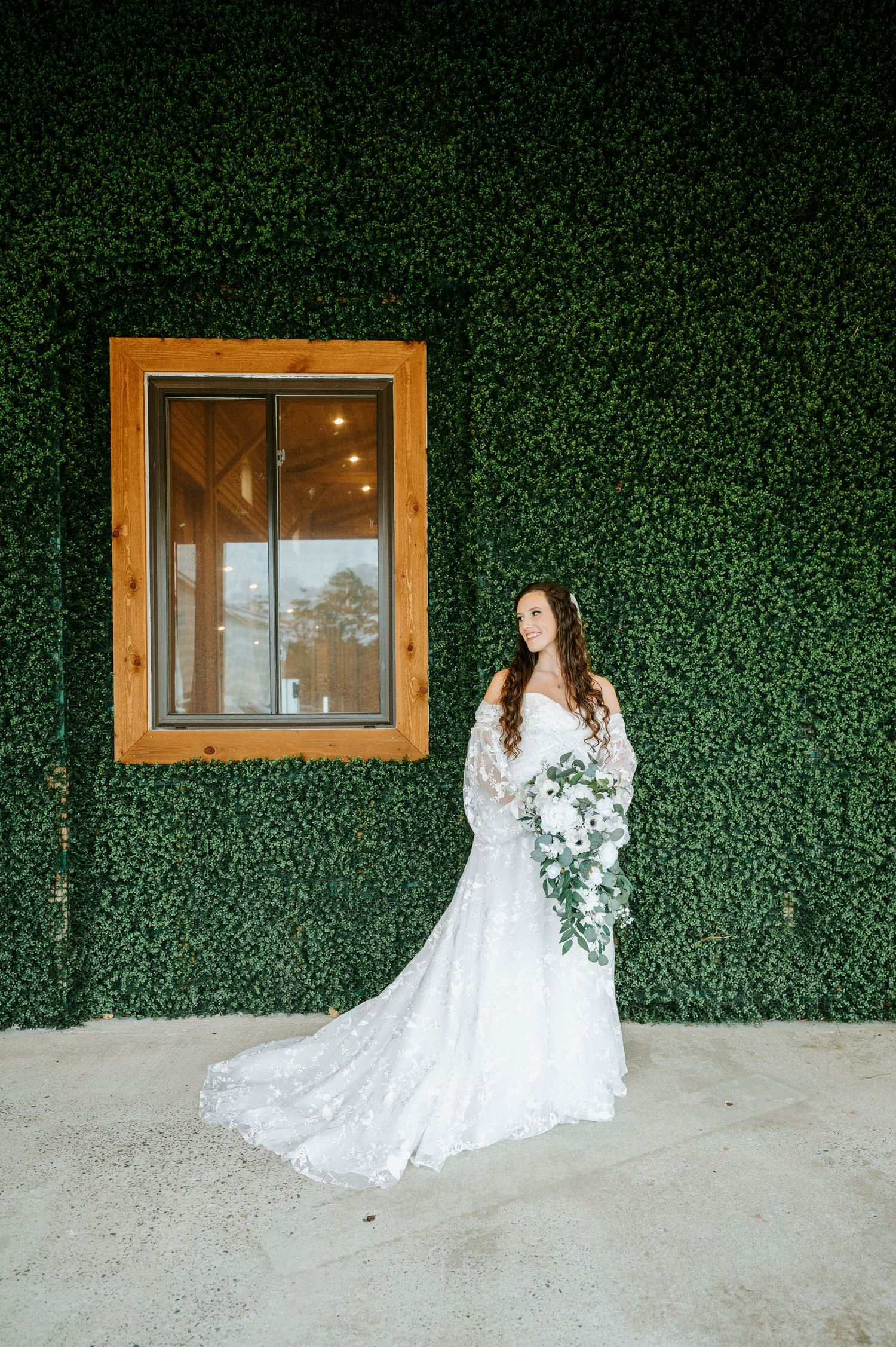 A sequence of bridal portraits against a lush green hedge wall with a wooden window frame.