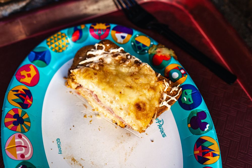 A sequence of colorful plates showing the progressive consumption of a slice of cake or pastry dessert.