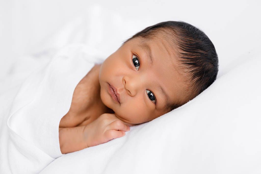 Portrait of awake newborn baby boy by professional Murrieta California newborn photographer