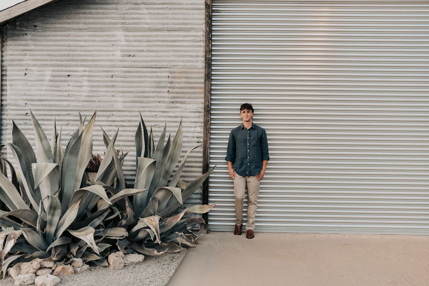 Editorial senior portraits in McKinney Texas downtown square with timeless architecture