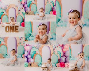 Pastel rainbow arch cake smash collage featuring baby girl milestone portraits and colorful first birthday setup in Magnolia, Texas.