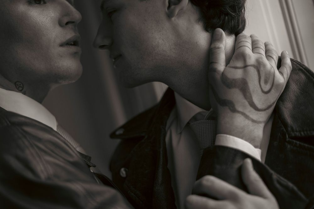 Black and white photo series showing emotional expressions and gestures in dramatic lighting.