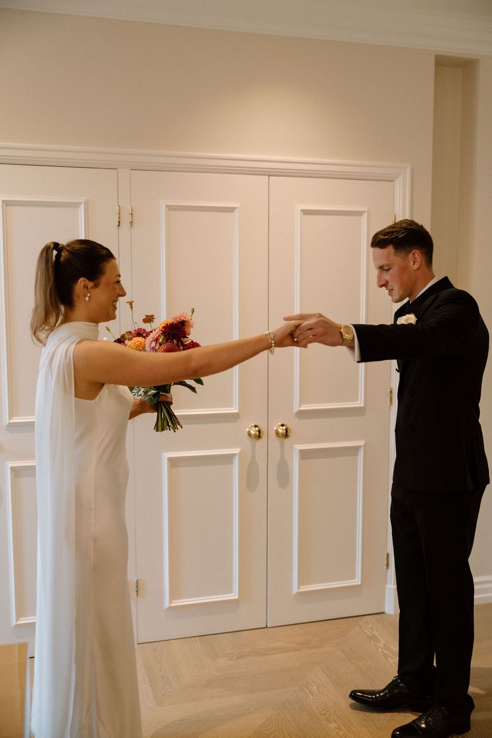 Bride and groom's first look at their wedding at The Landmark London.