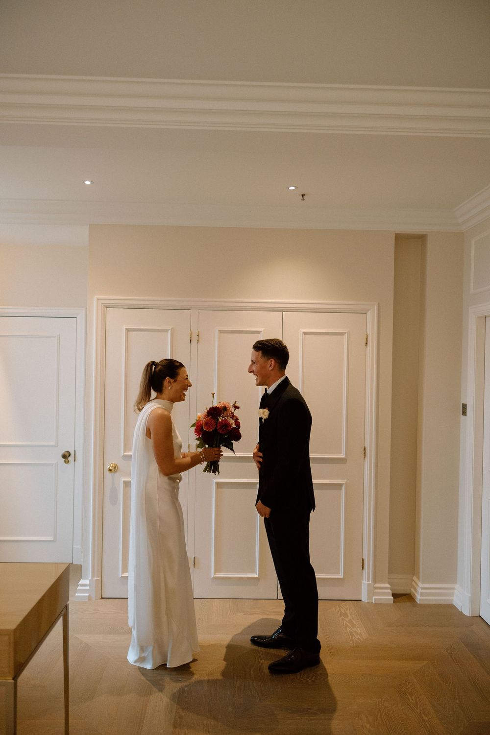 Bride and groom's first look at their wedding at The Landmark London.