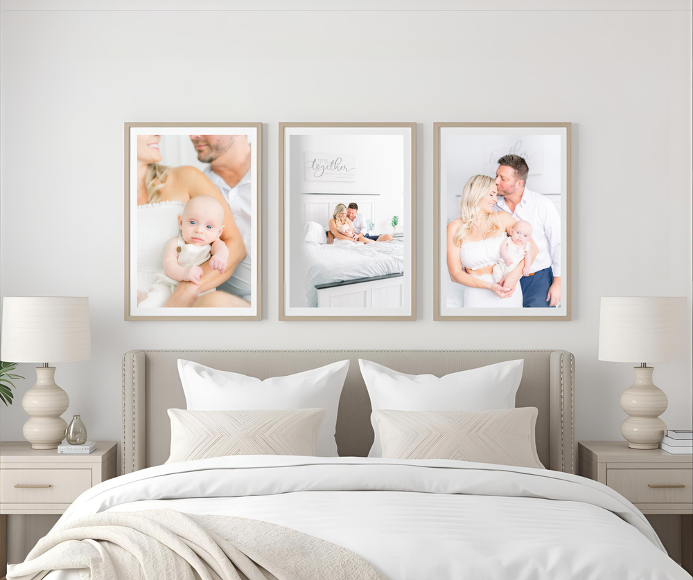 artwork hanging over a bed in the master bedroom of a beautiful family newborn photoshoot Tampa