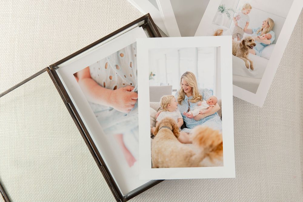 prints in a beautiful glass box of a newborn session in St. Petersburg florida