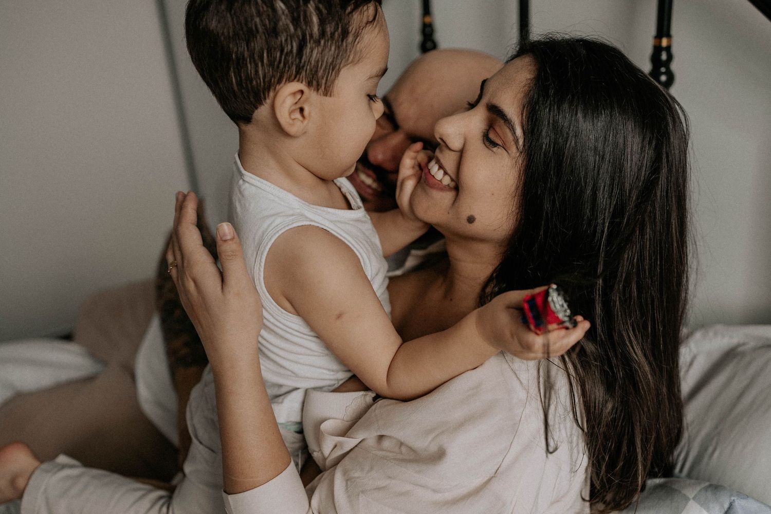 family hanging in their bedroom in York, Toronto
