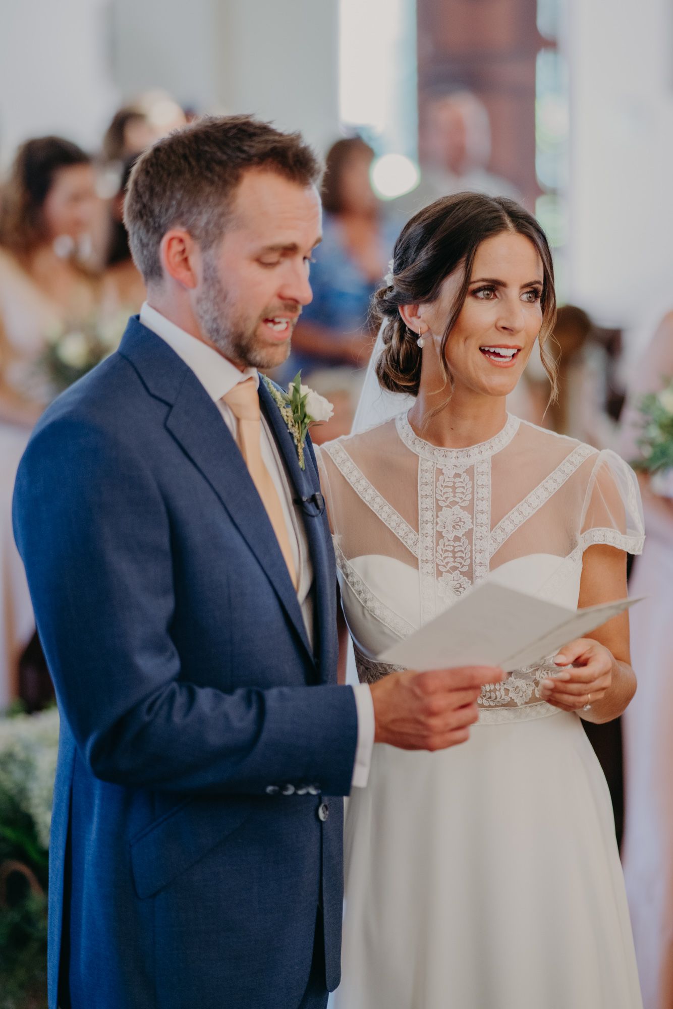 A couple shares an intimate moment during their wedding ceremony.