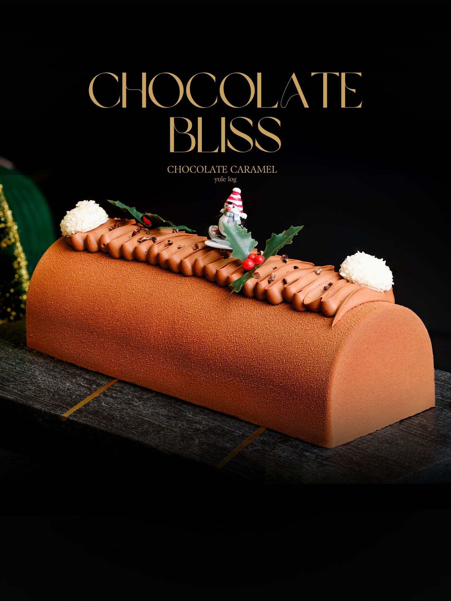 A chocolate caramel yule log cake decorated with holly and a festive gnome figurine on a dark background.