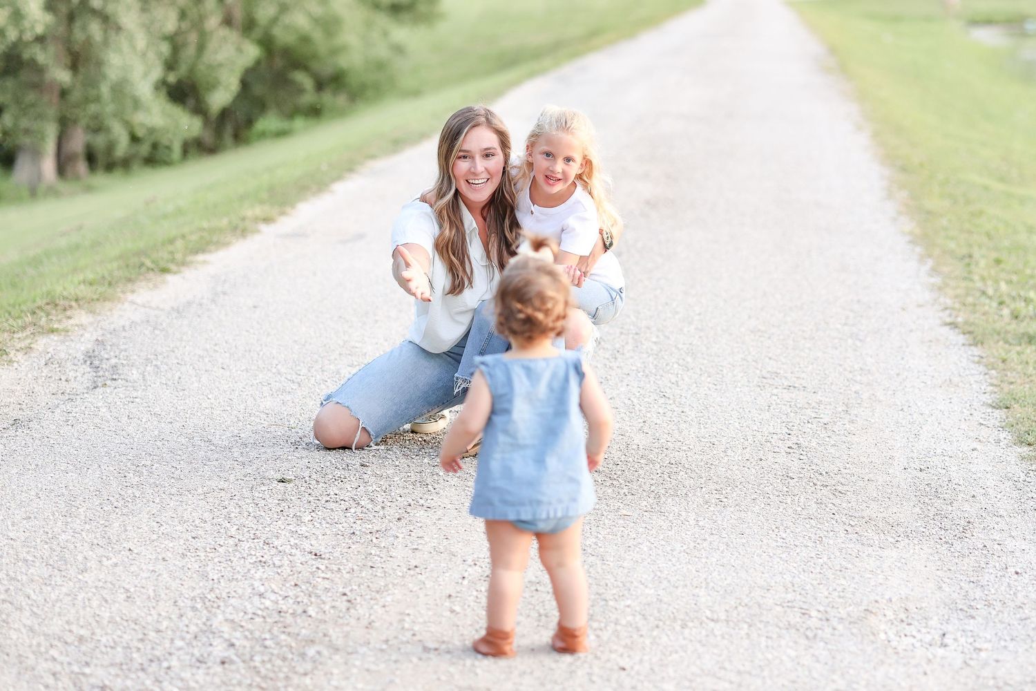 Springfield, IL Photographer captures a young girl walking to her aunt and cousin in Central, Il