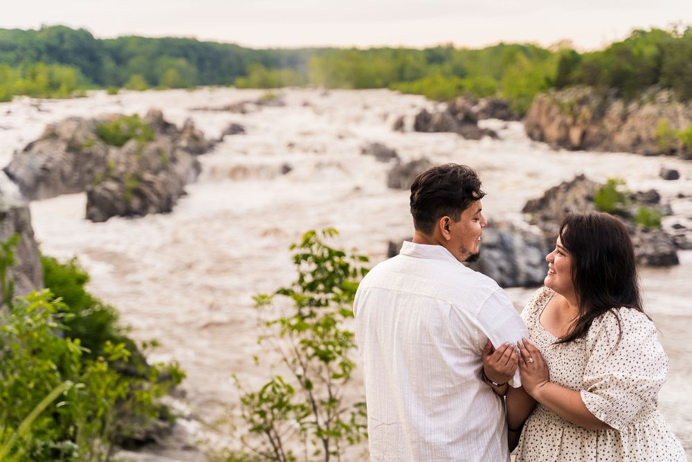 engagement shoot with a waterfall in the background onesixthree.studio