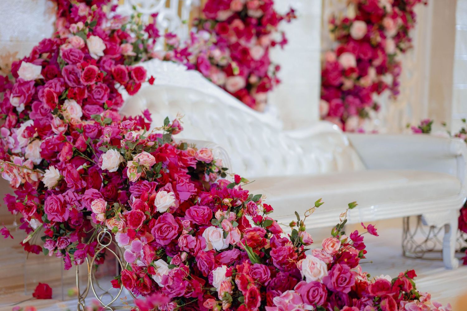 Lush, cascading white flower arrangements adorn the wedding reception. Calgary wedding.