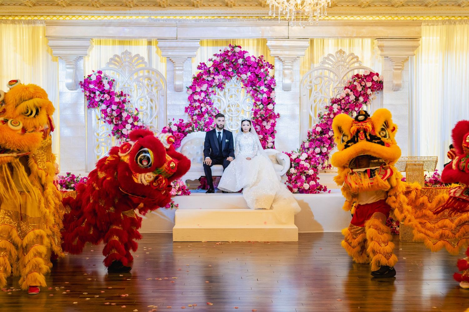 Vibrant lion dancers celebrate with the bride and groom. Cultural Vancouver wedding.