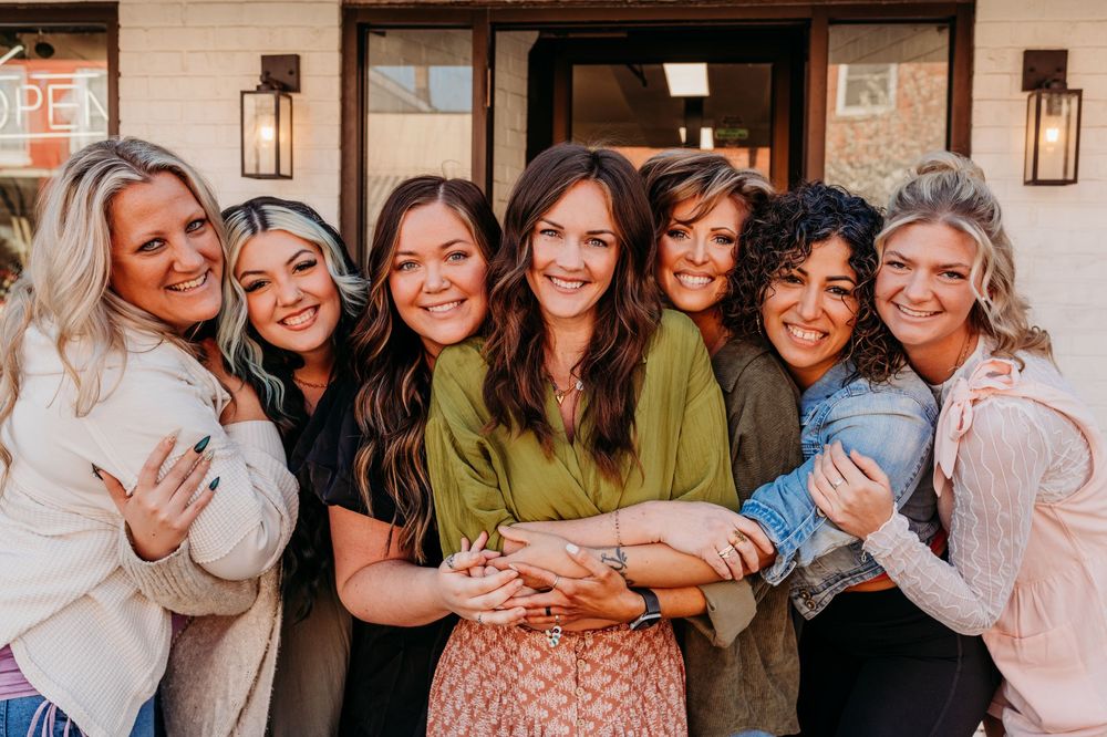 A collage of three group photos showing friends hugging and smiling together in casual settings.  Creative Photographer, Grand Rapids MI