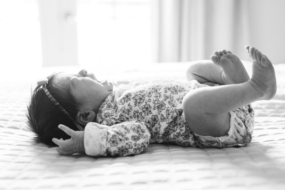 A sequence of yoga poses demonstrates the flow of movement from lying on the floor to a resting position.
