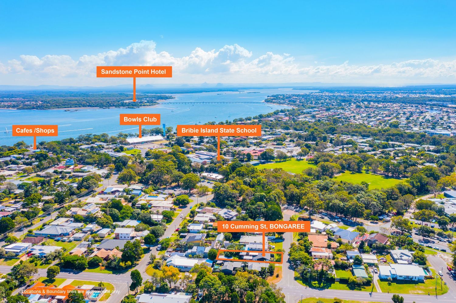 Aerial view of Bongaree home near Sandstone Point Hotel, Bowls Club, and Bribie Island State School.