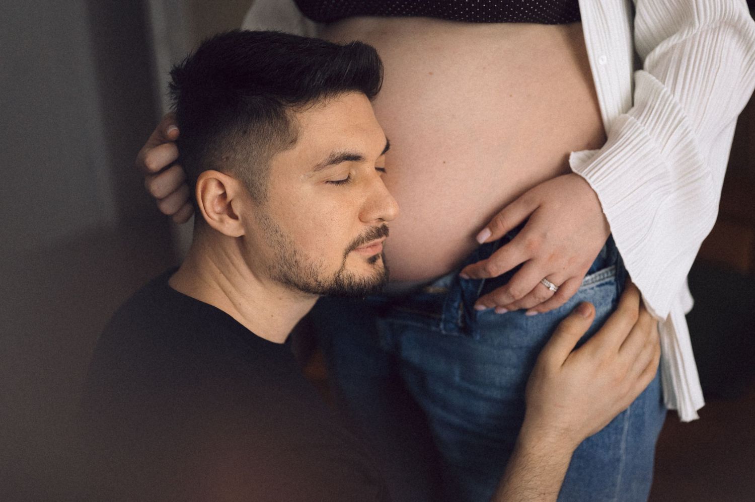 A series of intimate photos showing a couple embracing and sharing tender moments together.