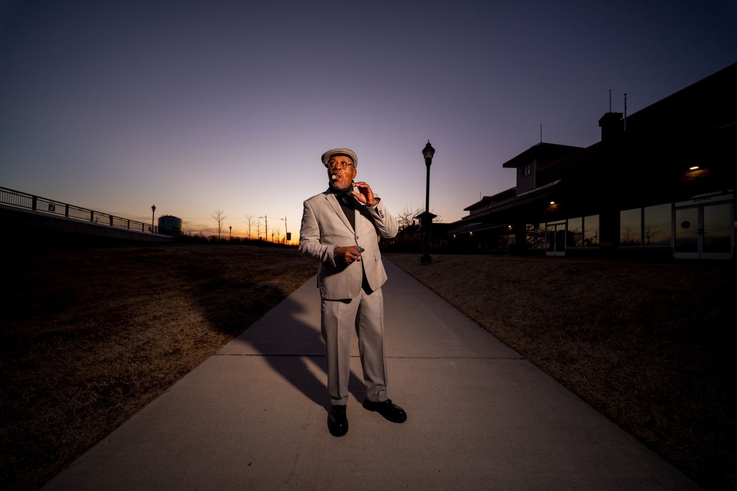 Randy Daye from CigarNewbieU enjoying a cigar outdoors at the Wilmington Riverfront in Wilmington Delaware.