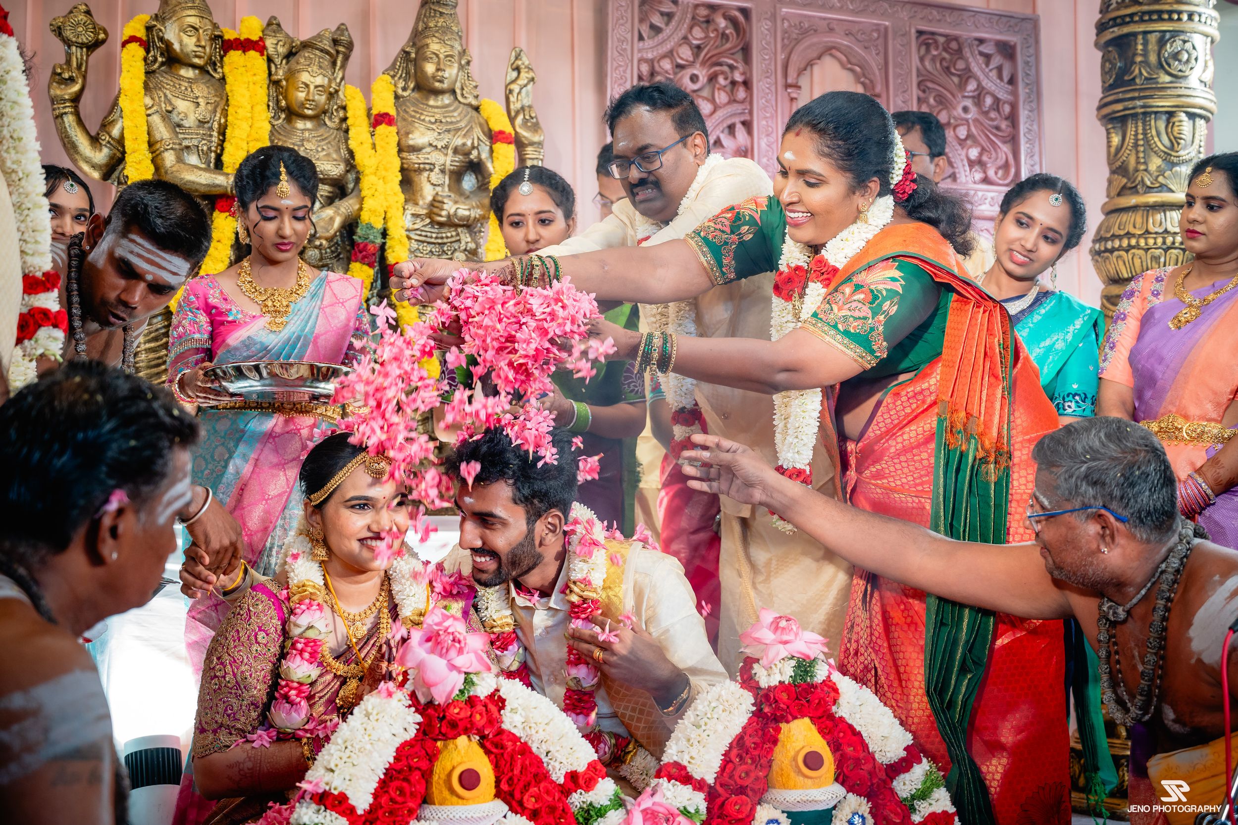 groom mom blessing bride and groom,candid wedding photography by Jeno Photography,trichy