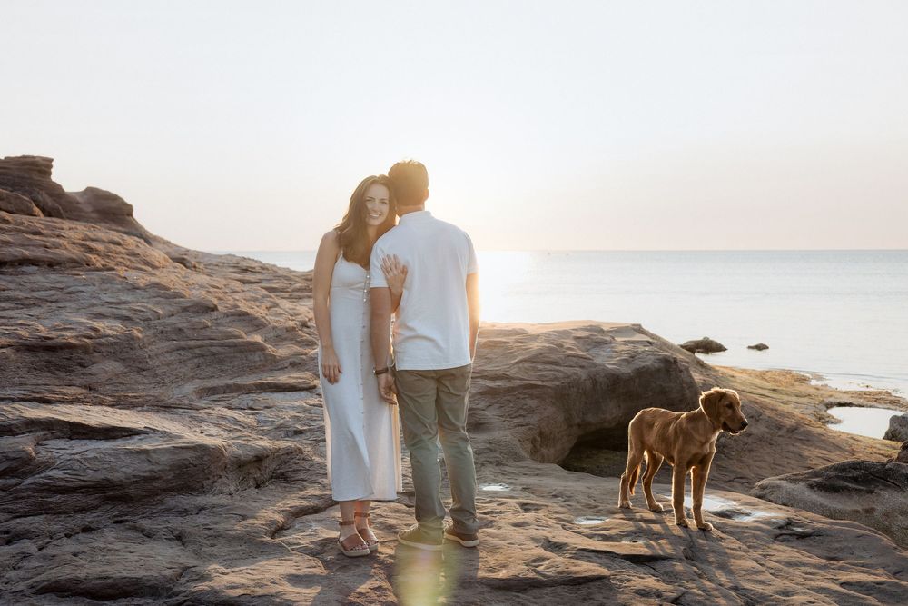romantic couples engagement session on rocky cliffs PEI destination photography, tourism New Brunswick, travel vacation photograph Moncton