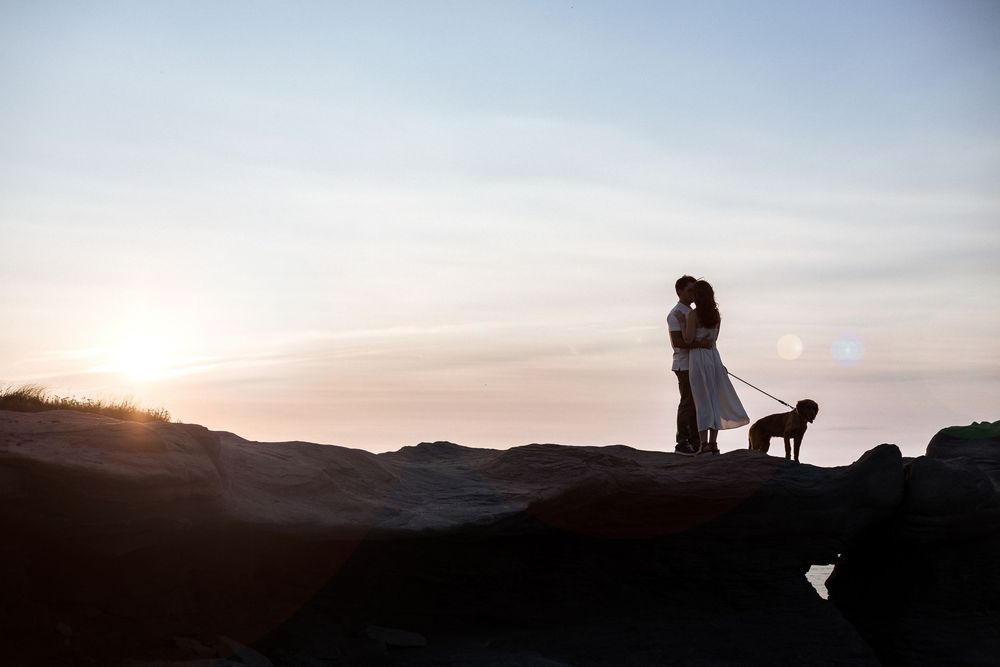 romantic couples engagement session at sunset, vacation photography packages in New Brunswick, destination photographer Parlee Beach Shediac