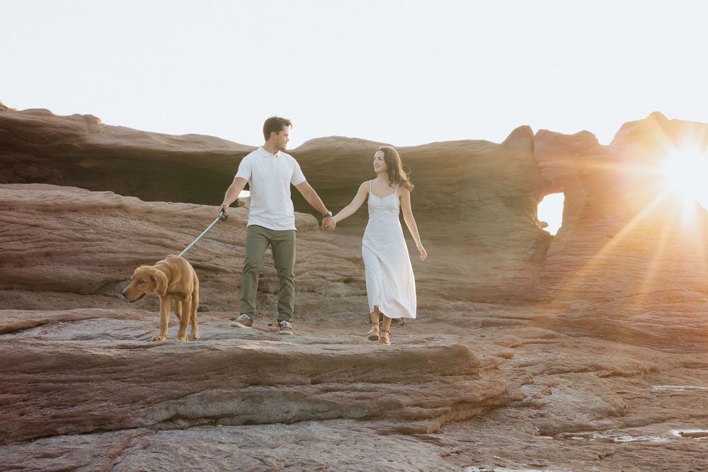 romantic couples engagement session on rocky cliffs PEI destination photography, tourism New Brunswick, travel vacation East Coast