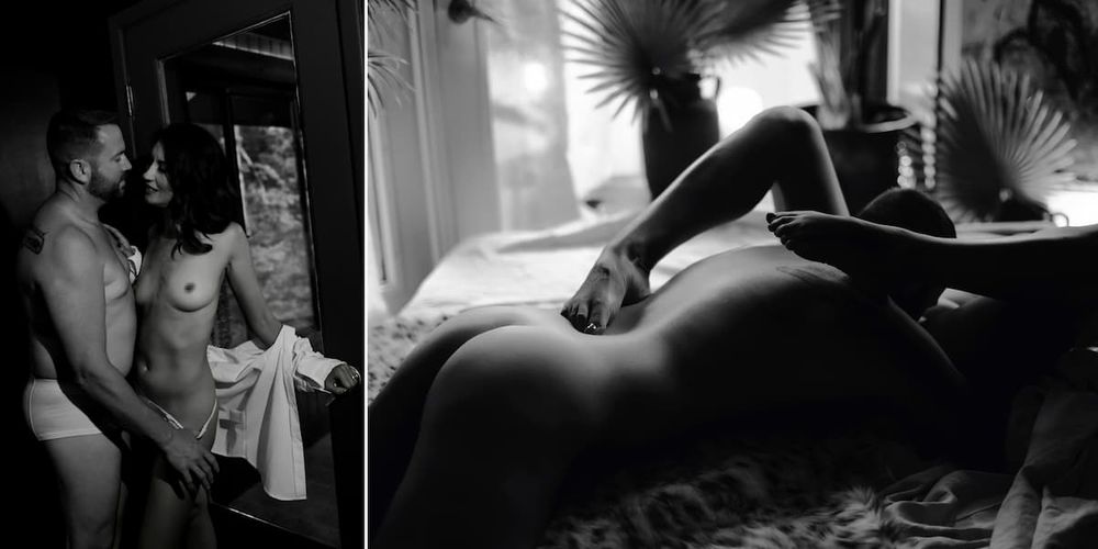 A couple shares a close dance moment in black and white lighting creating an intimate atmospheric scene.