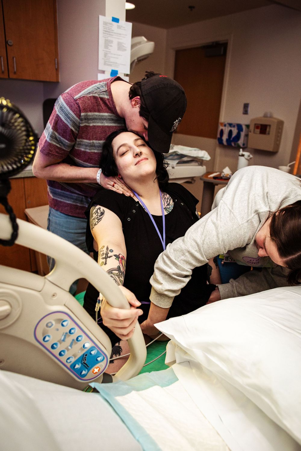Medical monitoring equipment being used on a patient lying in a hospital bed.