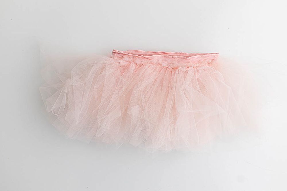 Pink tulle tutu skirt with elastic waistband for kids photography in Menifee California.