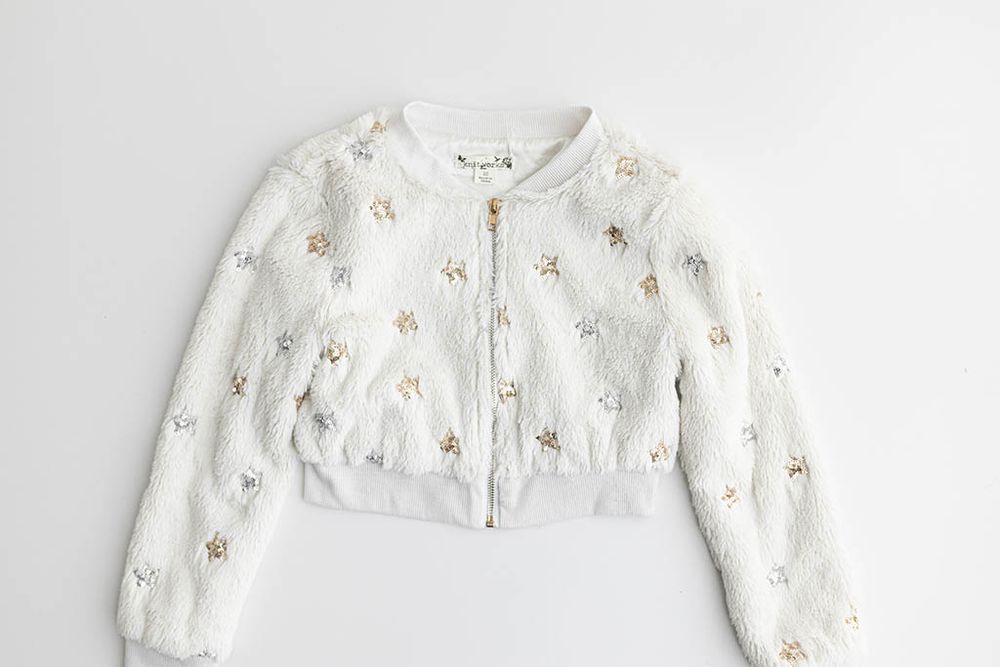 White faux fur cropped cardigan for child photography closet in Southern California.