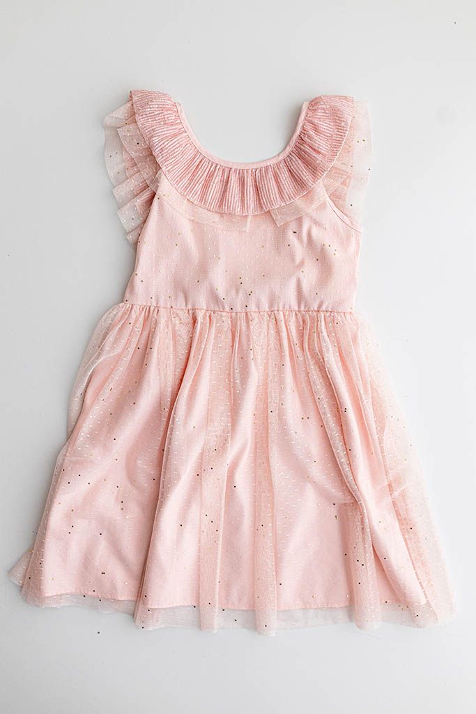 Pink girls dress with glitter dot tulle skirt and ruffled flutter sleeves.