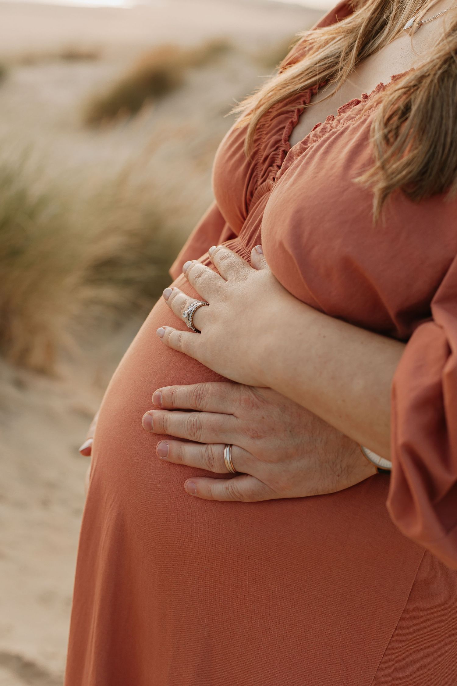 Pregnancy photoshoot with partner at the beach in South east