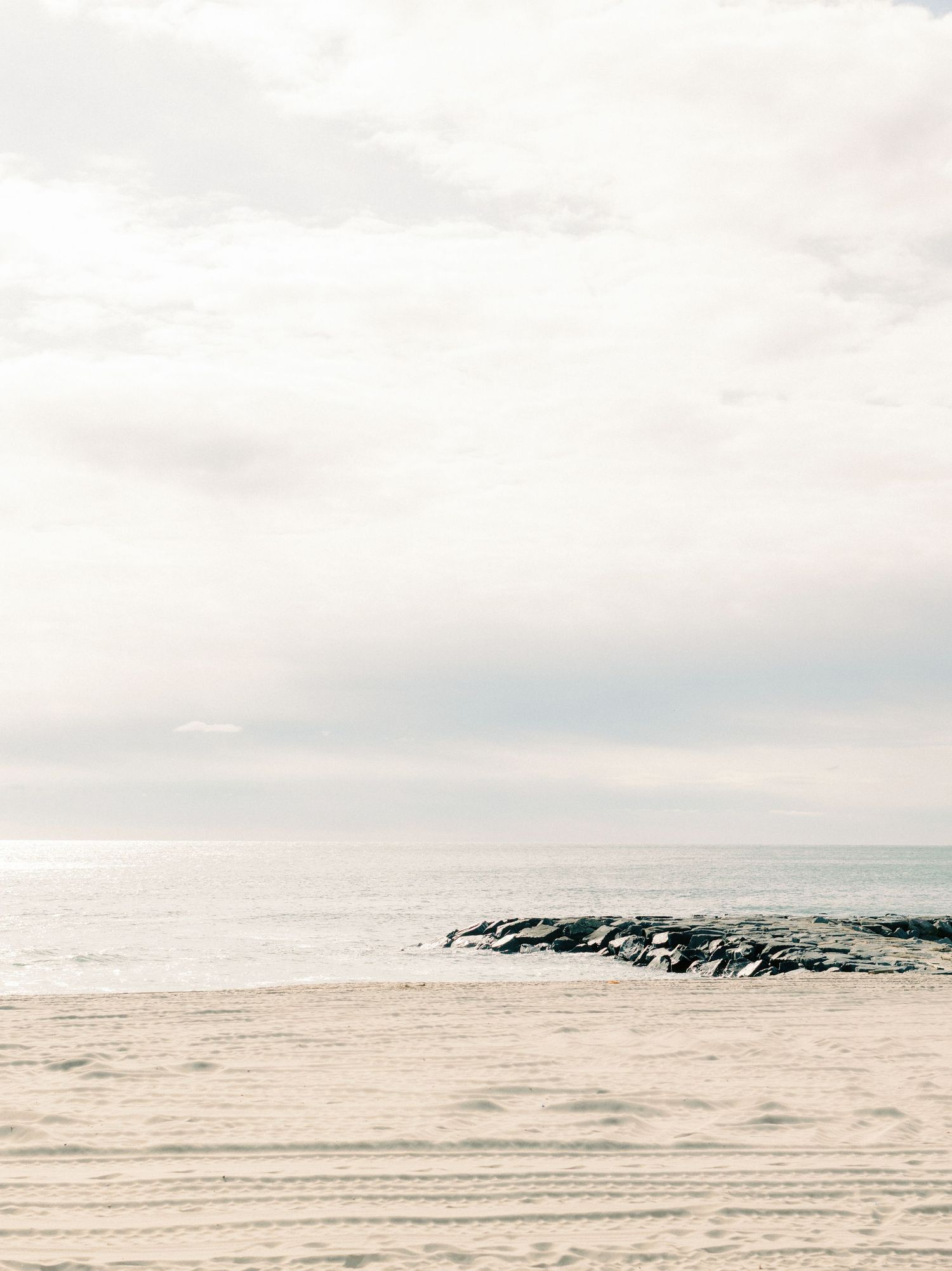 Early morning Asbury Park Engagement session Jeanie Jang photo New Jersey wedding photographer