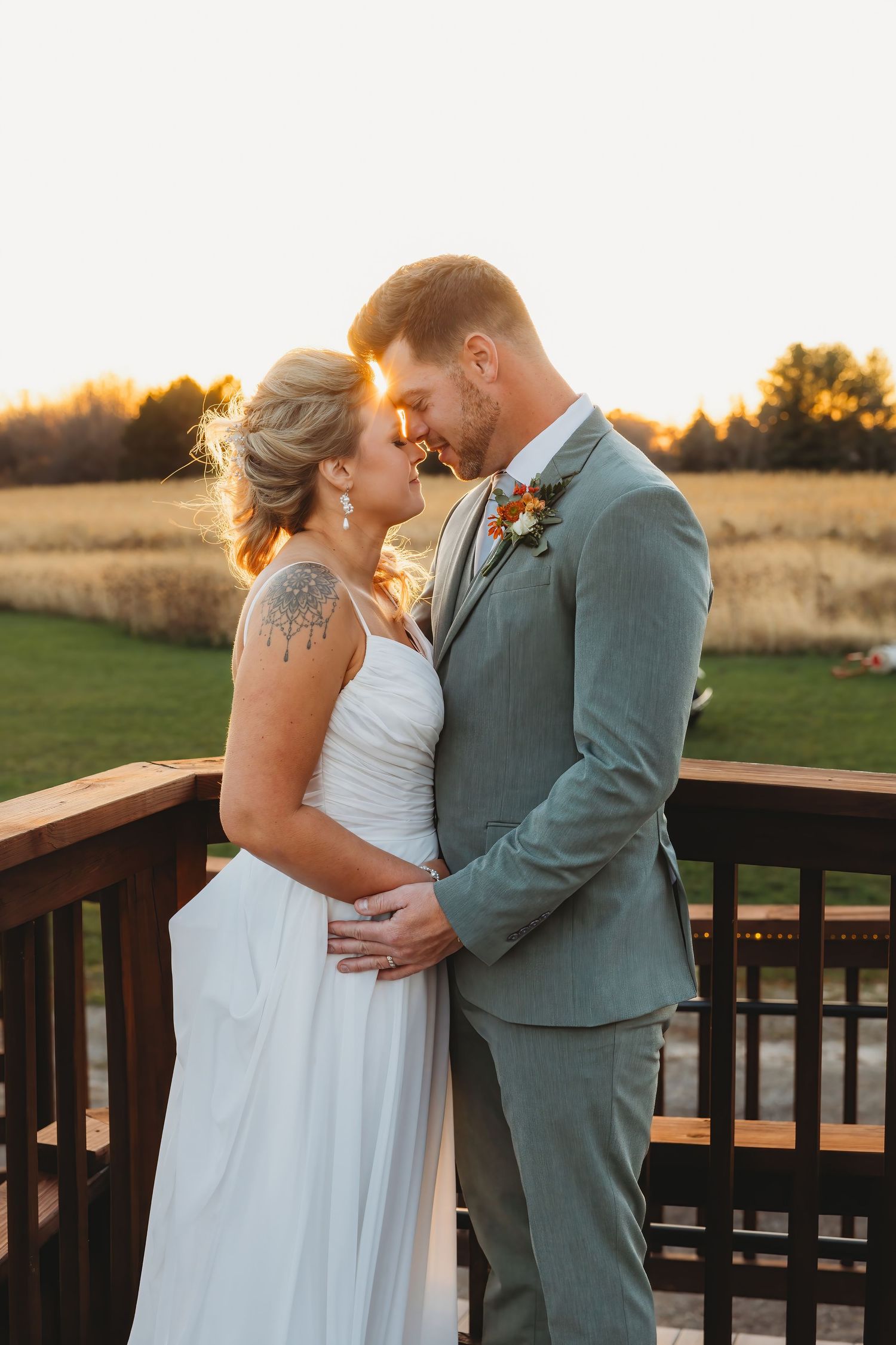Romantic sunset moment on a wooden deck with soft golden light.
