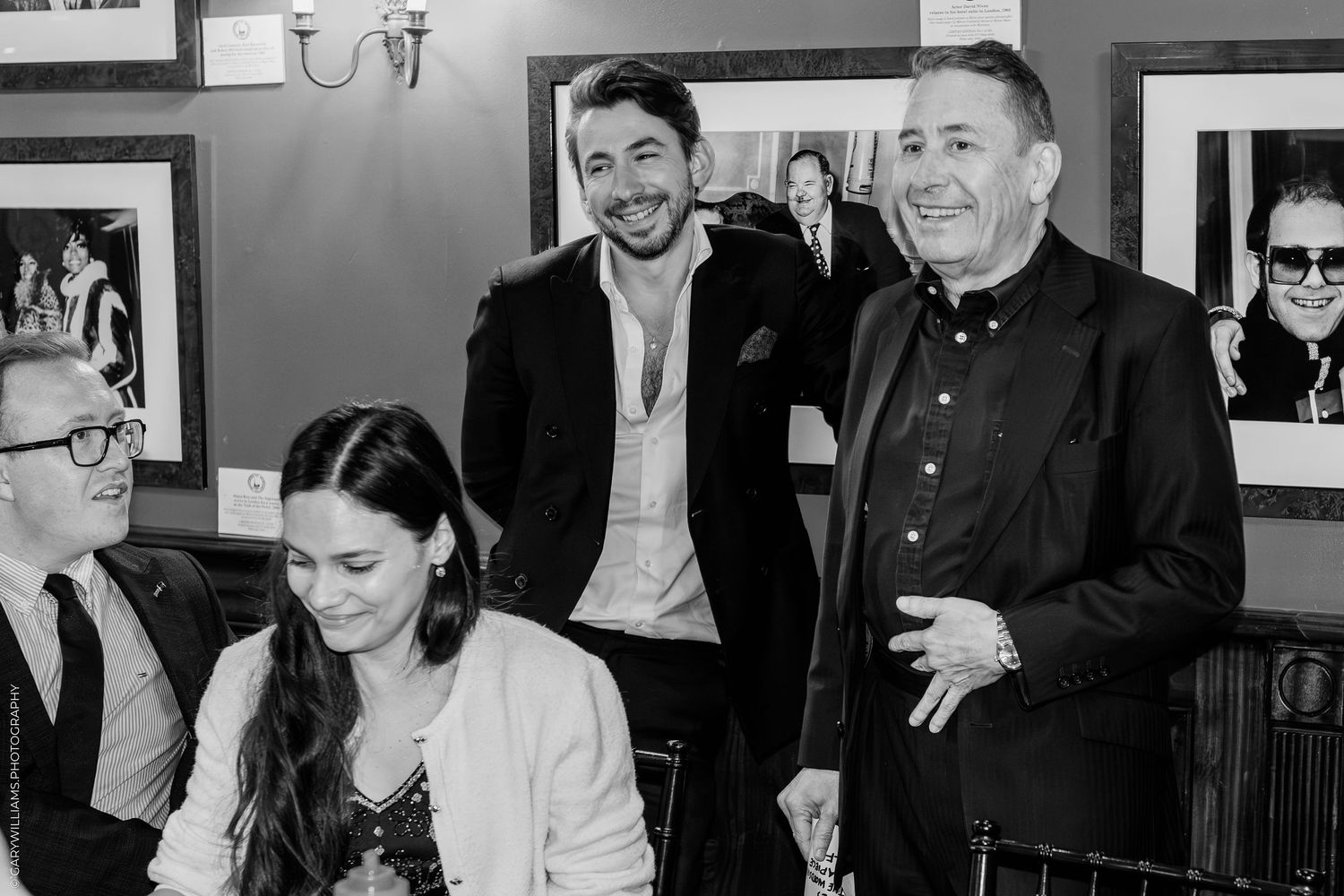 Black and white photo of Jools Holland, Lady Va and Ed Richardson at Boisdale