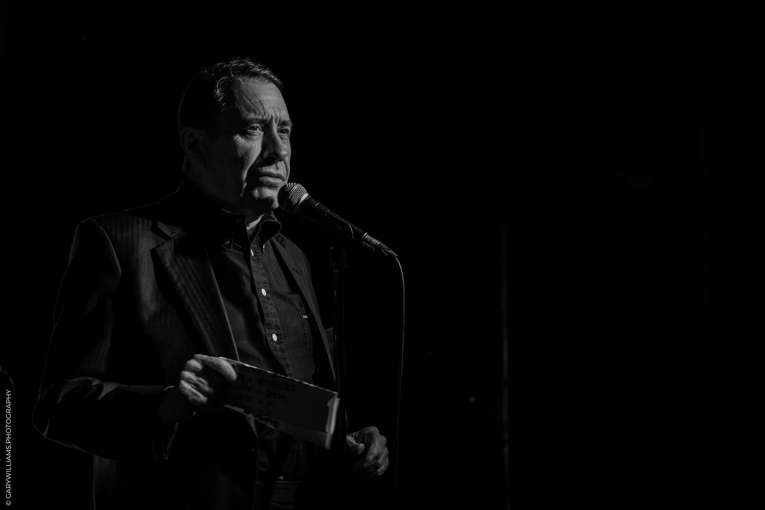 Black and white photo of Jools Holland on stage at Boisdale