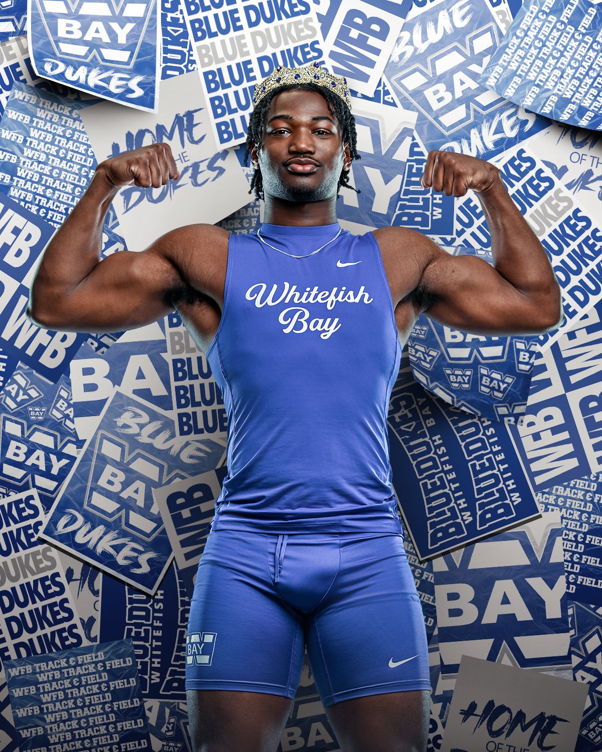 Whitefish Bay Blue Dukes athlete flexing in blue Nike uniform against a blue and white team logo backdrop.