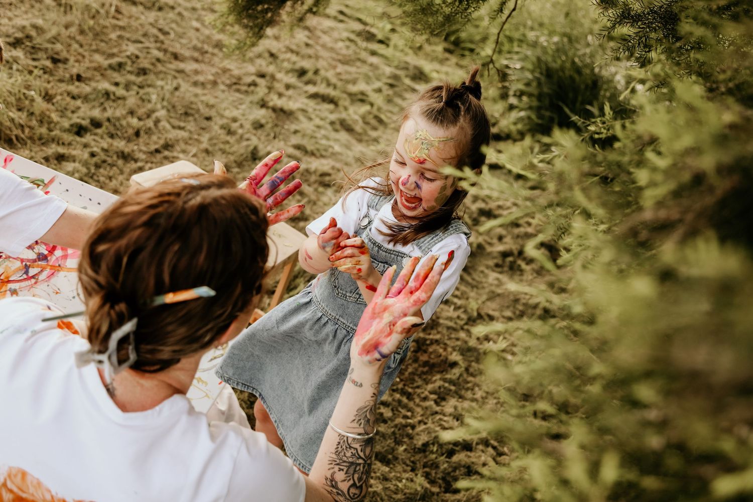 The mums cop the paint during the paint and me sessions and those smiles say it all!