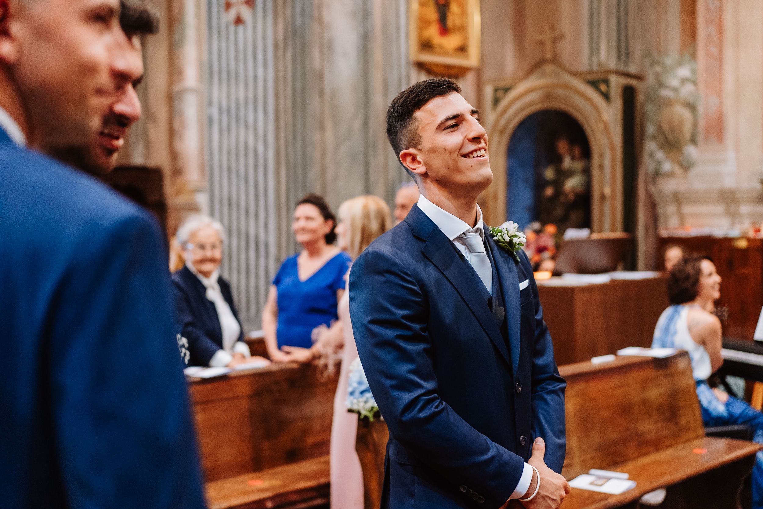 A sequence of candid church wedding ceremony photographs showing joyful and emotional moments between attendees.