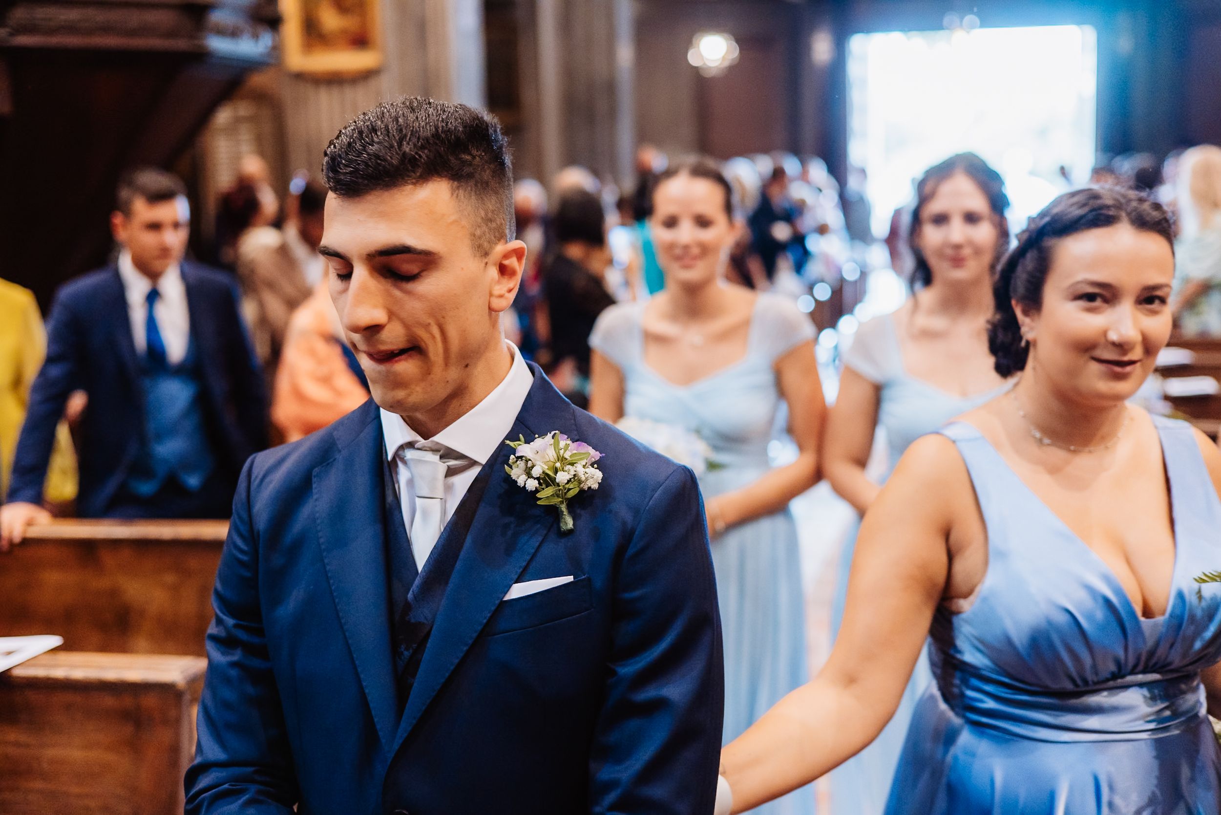 A collection of wedding celebration photos showing guests dancing and celebrating at an elegant indoor reception venue.