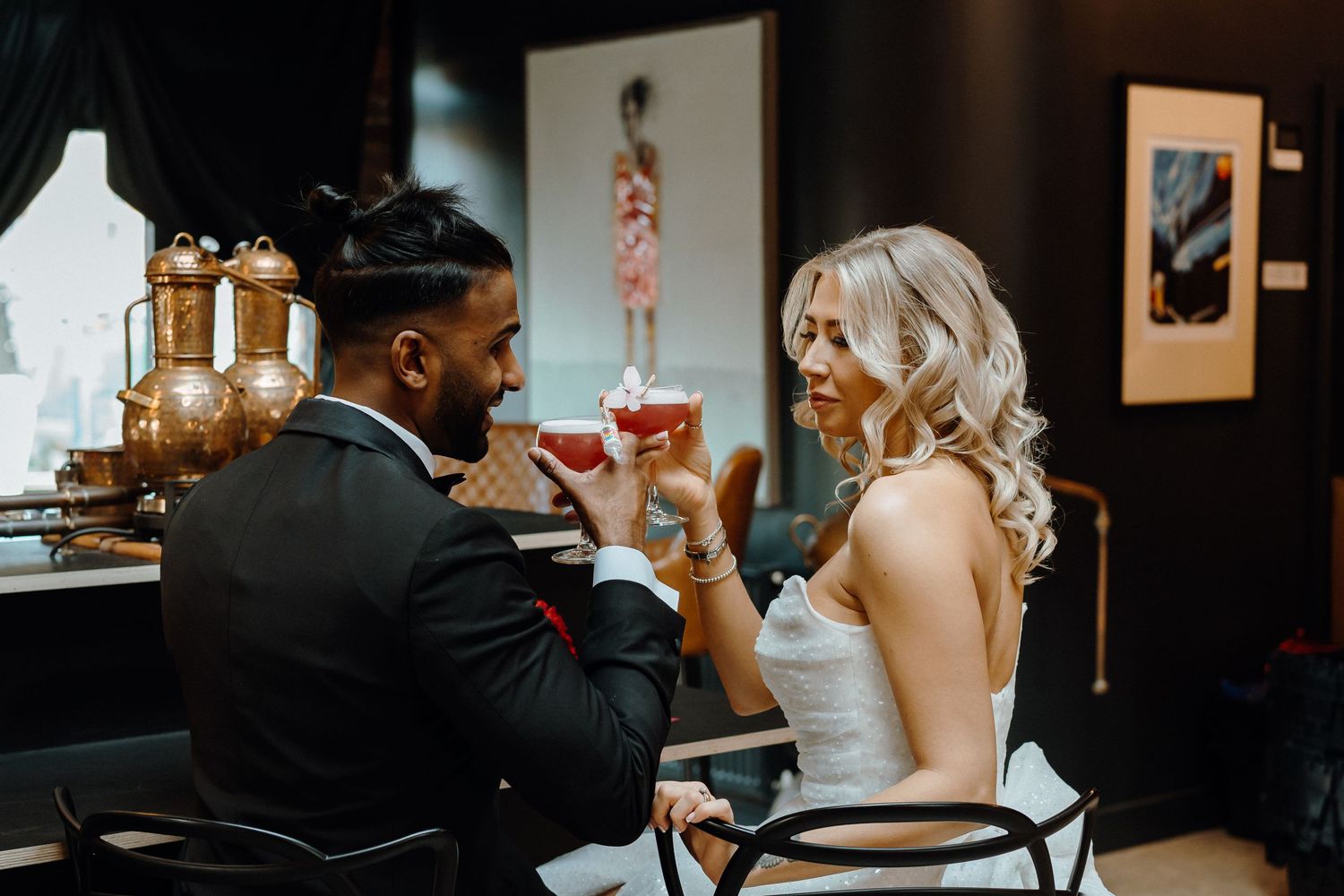 Artististic black and white photographs displayed in sequence showing stages of a wedding day celebration.